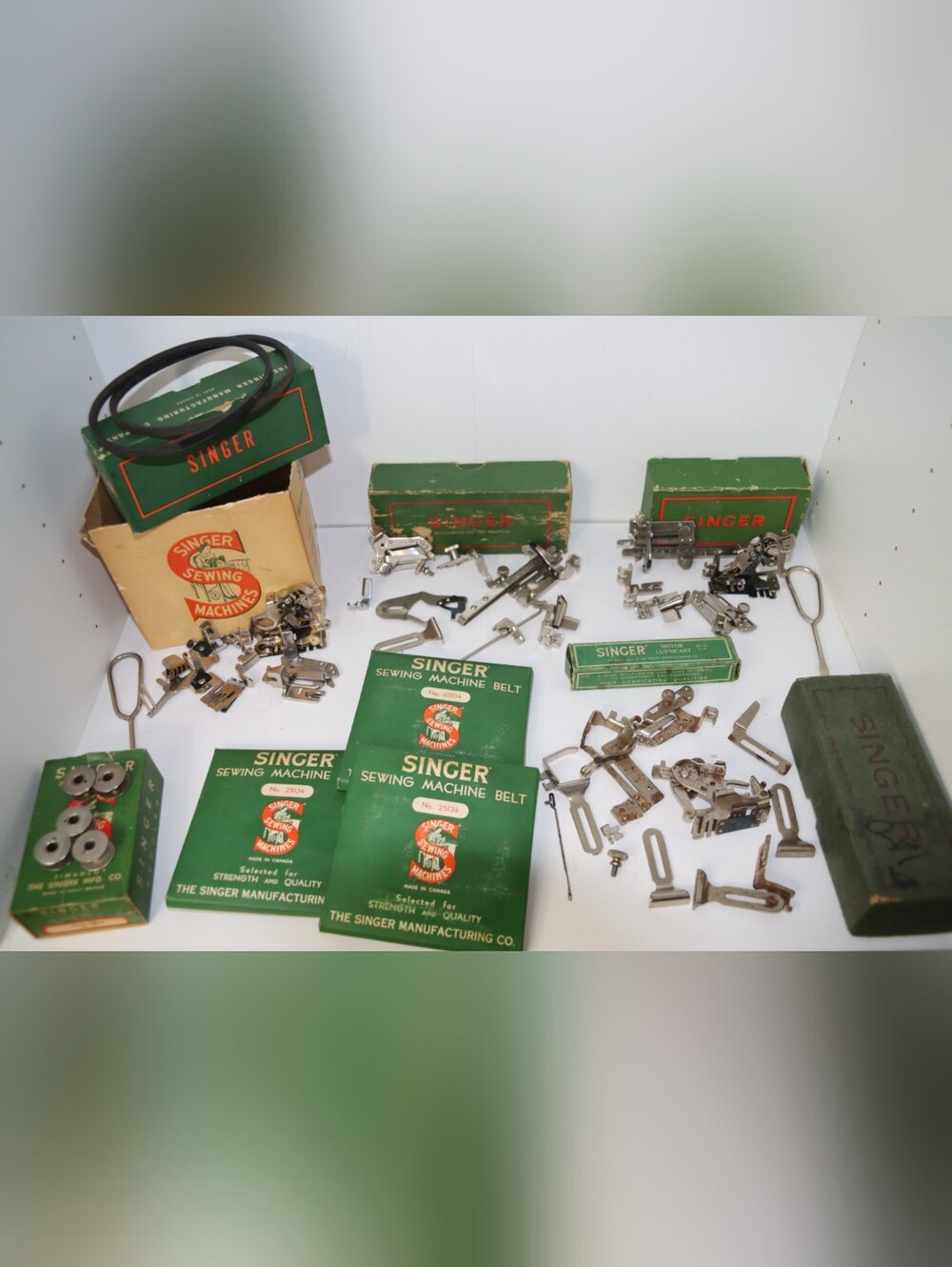 Collection Of Singer Sewing Attachments